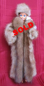 Full length fur doll coat with natural pastel mink sides and lunaraine mink tuxedo front.